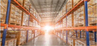 Interior of sustainable industrial warehouse with pallets and shelves.